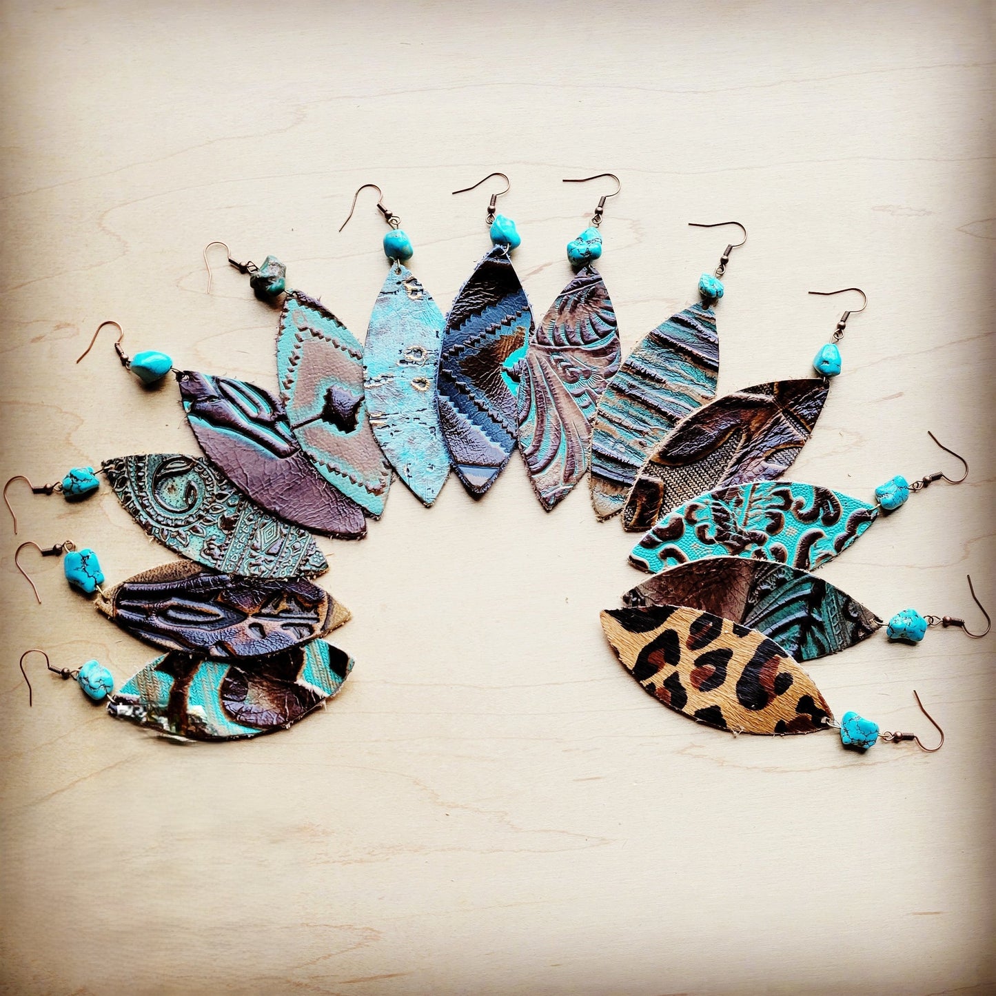 **Leather Oval Earrings in Brown Floral w/ Turquoise Accent 206r