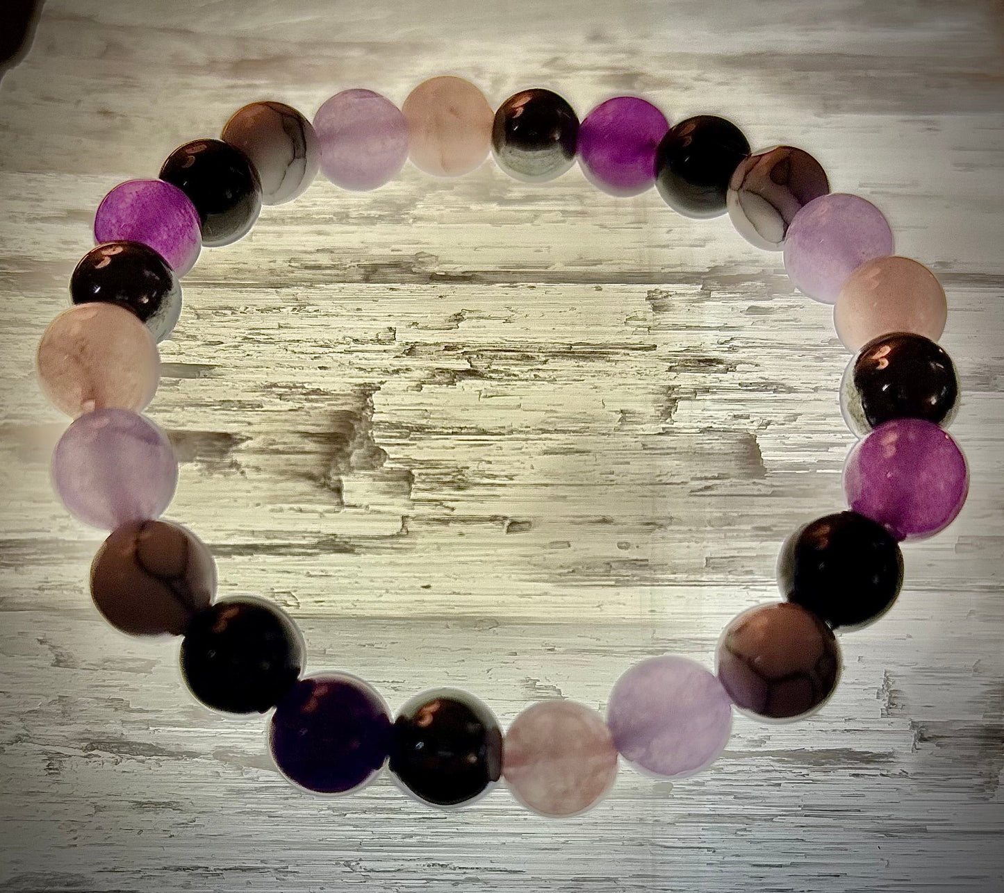 The Empaths Recharge Bracelet (amethyst, Clear Quartz, Rose Quartz, White Howlite, Black Tourmaline)