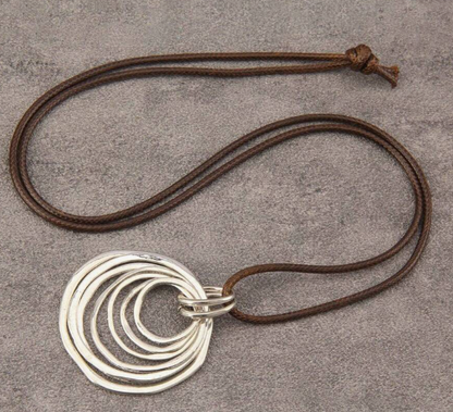 🔘 7-Layered Asymmetrical Circle Pendant Necklace – Bold. Minimal. Fabulous.