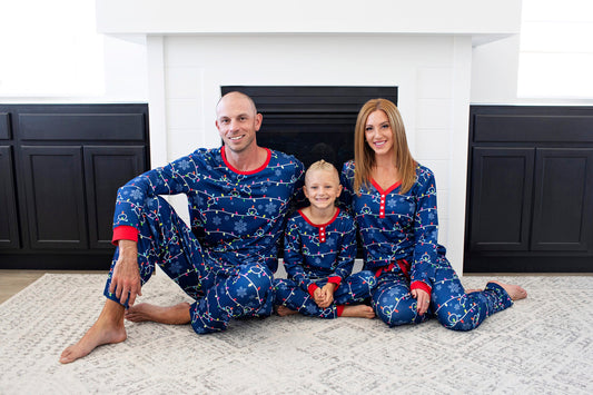 Matching Family Christmas Pajamas In Christmas Lights