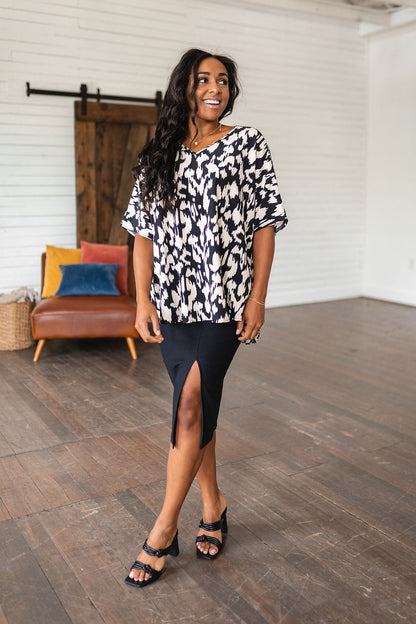 Unforgettable V-Neck Animal Print Blouse in Black