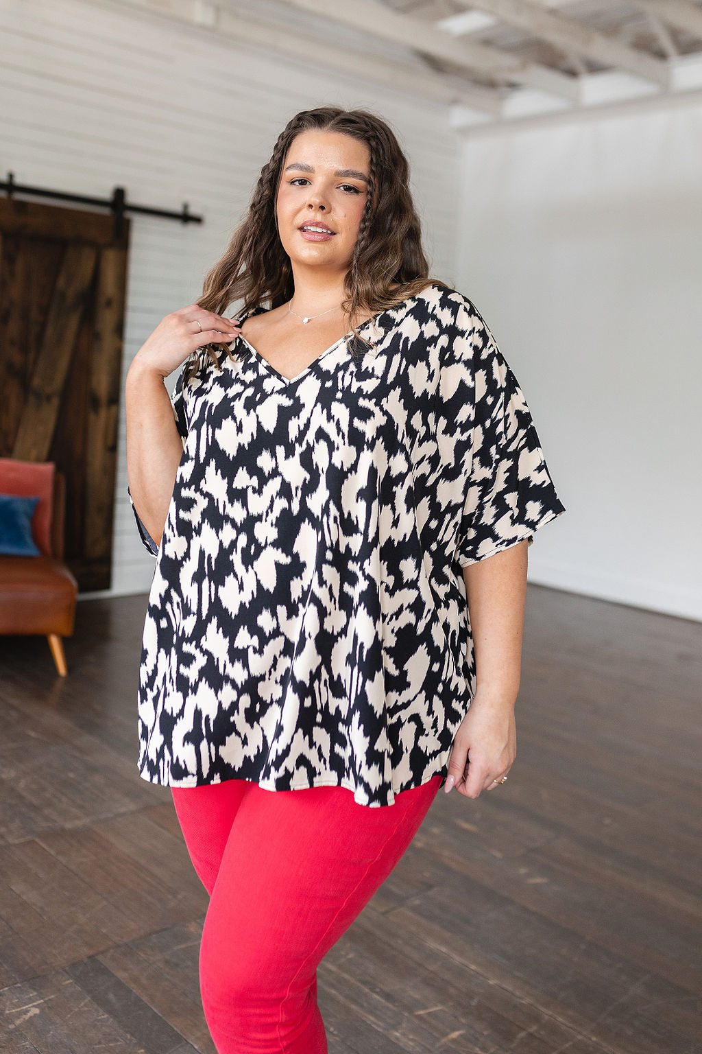 Unforgettable V-Neck Animal Print Blouse in Black